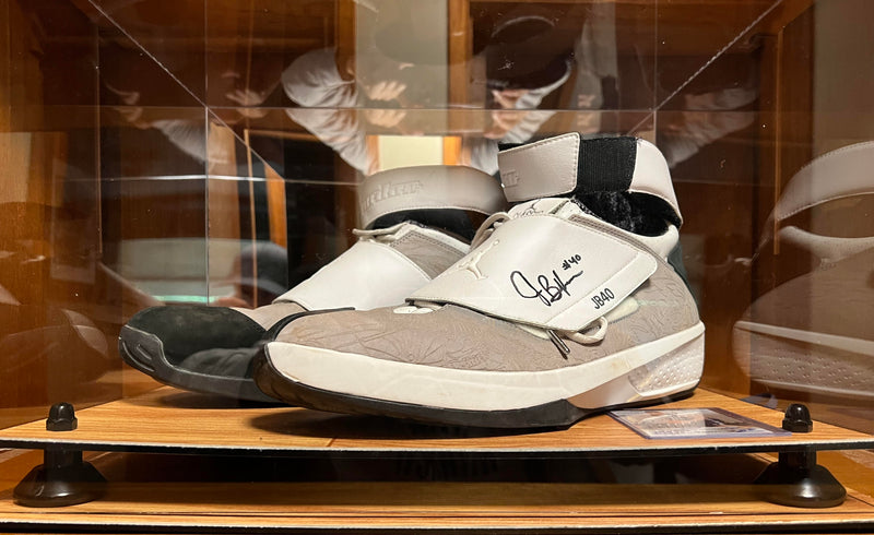 Display Case with Autographed Shoes by the NBA Trickshotter